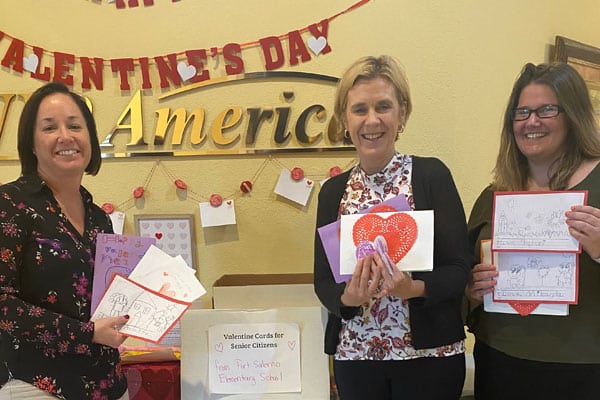 Jill Ball, president, and Patricia Idarraga, Southeast Administrator for VIP, with Amy Porter at Port Salerno Elementary School. Students in k-fifth grade donated 100 cards they made.